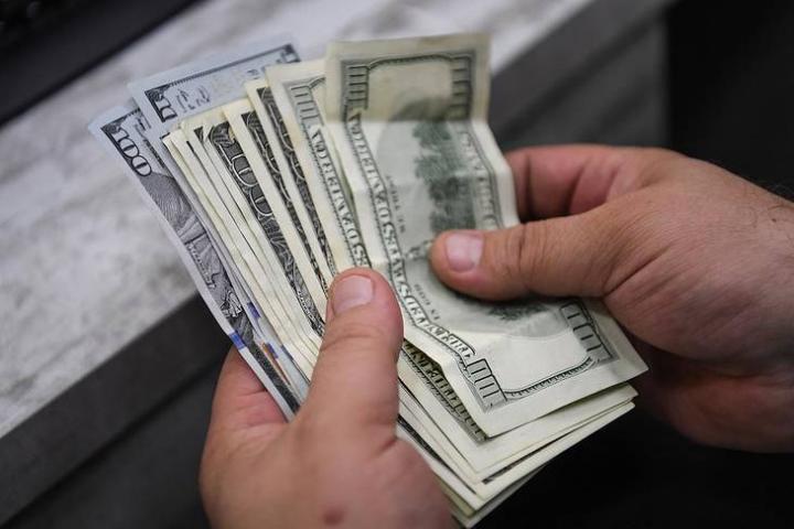 Proyectan un dólar a $ 59 en menos de un año