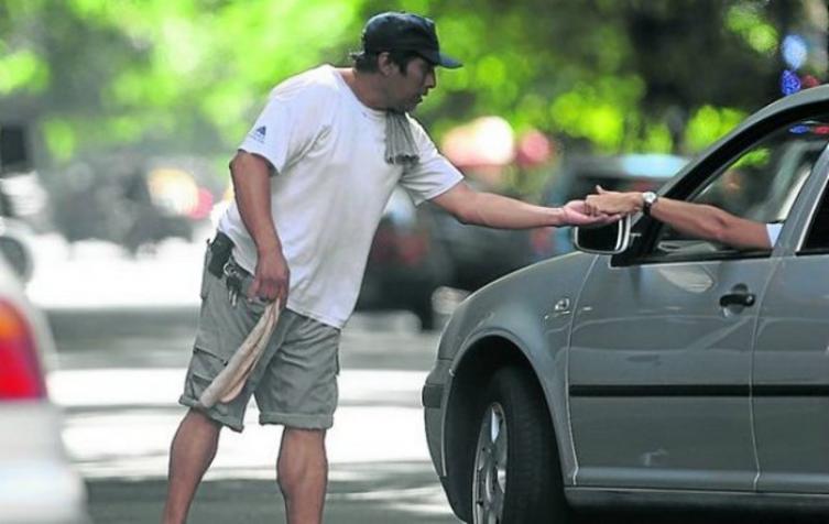 Cuidacoches rosarinos ganan $25 mil al mes